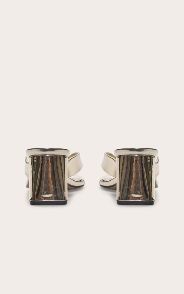 2d7b3a41e262894d579fb695ab0c7b9d2a6bda3f_CNM1046_3_gold_pu_round_toe_thong_mid_block_heeled_mules