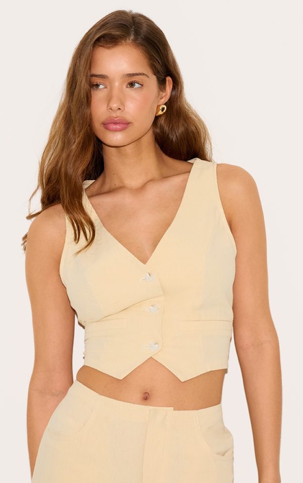 2db3595f3f2d47b49c3aef16b02f6ee5207923d1_CNM1801_1_butter_yellow_backless_waistcoat