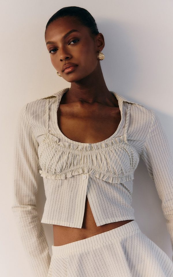 2e4d67c239a5a867571b7c3e747f13eb067d6424_CNM2485_4_cream_pinstripe_seersucker_flippy_mini_skirt
