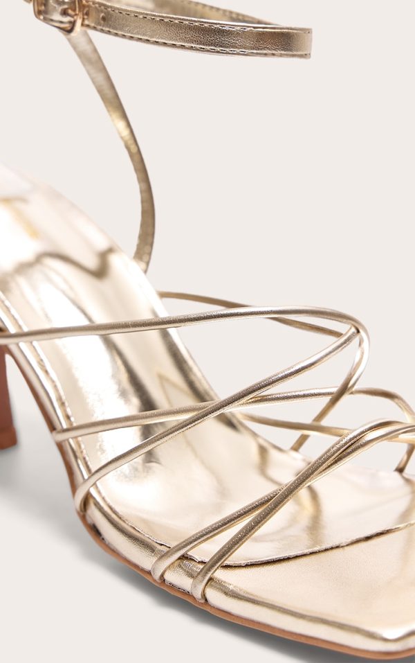 2e908eb88fc66d987c9b5ca91cae78c8f70b709a_CNB5374_4_gold_pu_metallic_square_toe_cross_over_strappy_mid_heeled_sandals