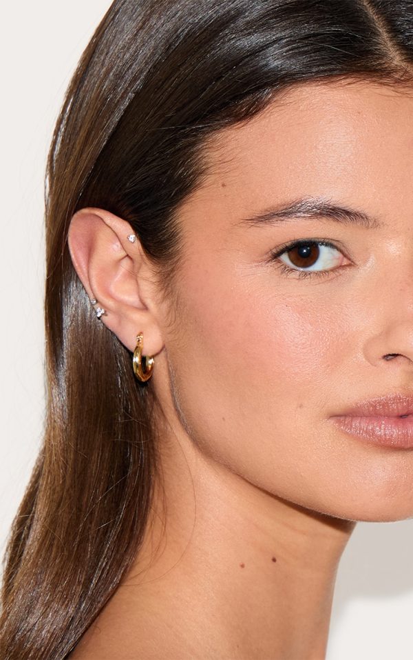 2ee25a7b37443fc8a522495e0610c70dbf070863_CMU3084_3_real_gold_plated_mini_twist_detail_thin_hoop_earrings