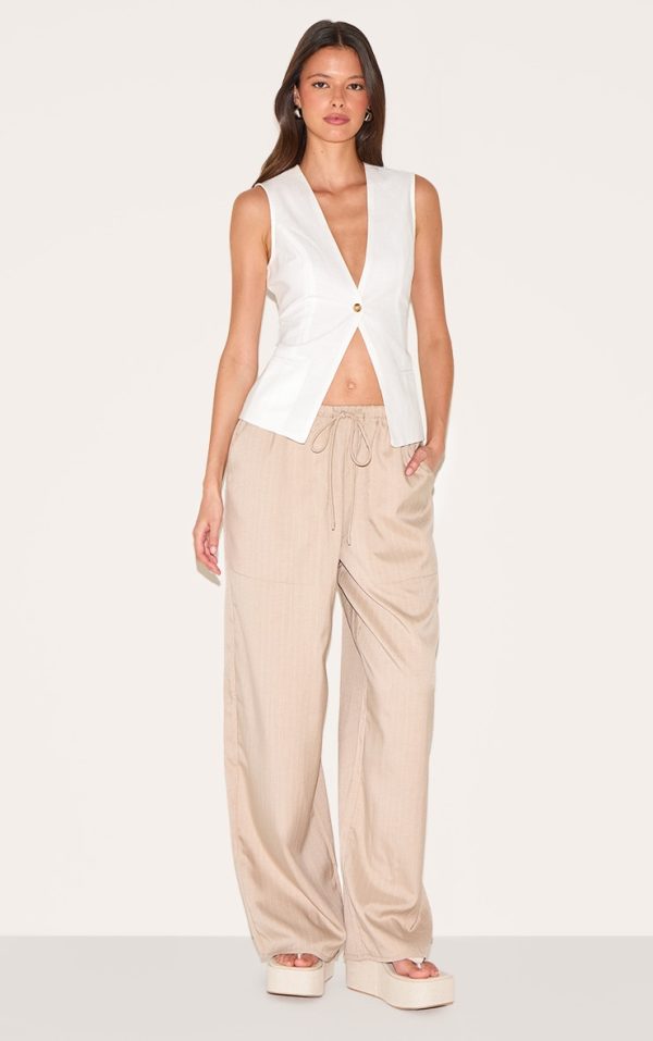 2f5e91abb395a53ee2d9e8c928368e9b22dc793d_CNL7554_1_stone_pinstripe_woven_drawstring_low_rise_relaxed_trousers