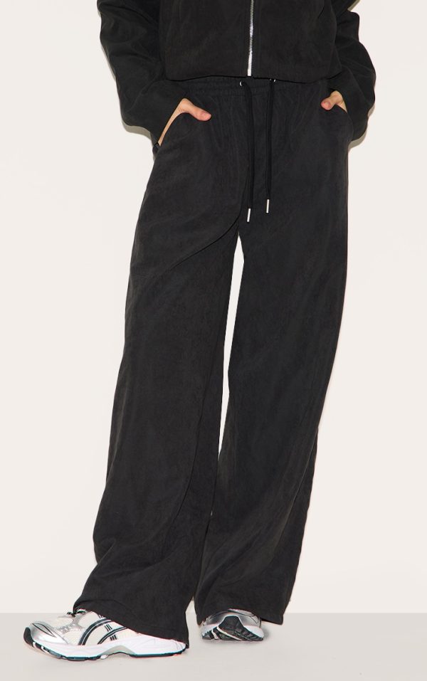 2f6a3018f993d42b61805c657f52cb2c8f03c7d9_CNM0139_2_black_peach_skin_woven_wide_leg_trousers