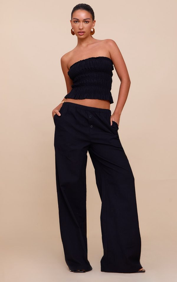 30b51c92a279c56ac73d68a06abdfc280839d2a8_CNM6116_1_black_low_rise_wide_trousers