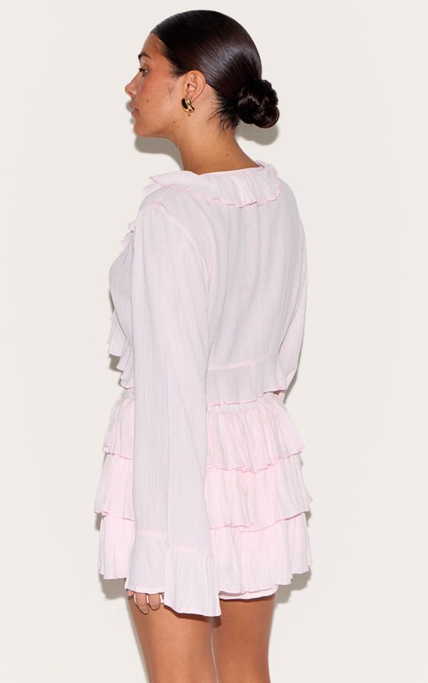 30cf09958a6692cade5c107cfef96593ec28b73d_CNM3971_2_petite_pink_cheesecloth_ruffle_tie_front_long_sleeve_top
