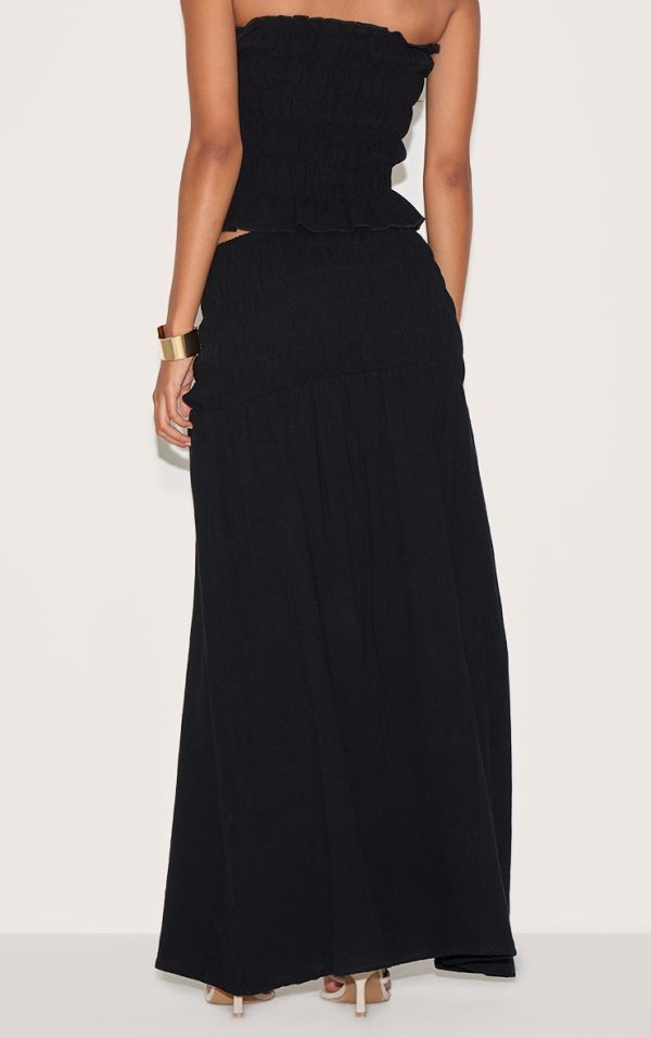 3113e90f7c9f6f729669799ac9a7e5d4ea16c5f6_CNM9995_3_black_textured_shirred_panel_mid_rise_maxi_skirt