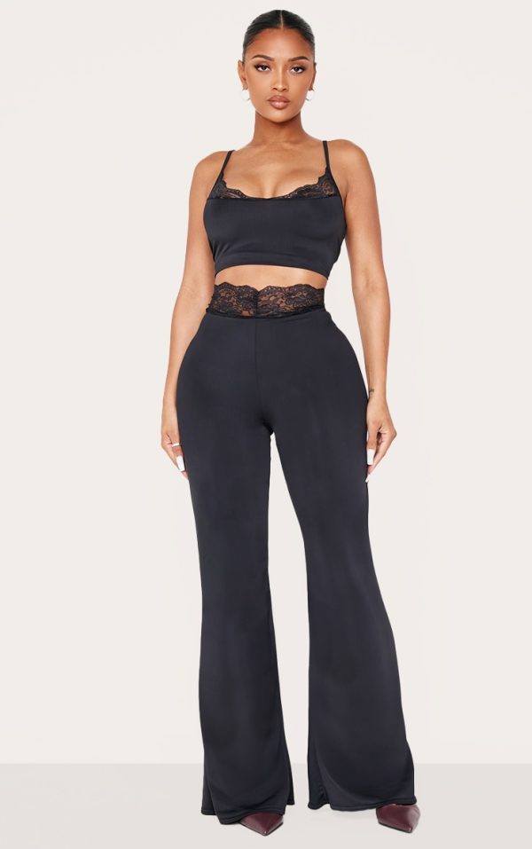 318afeecee081630cc6bdaa29f4ffce14e4dd5b7_CNK8899_1_shape_black_sculpt_lace_trim_flared_trousers