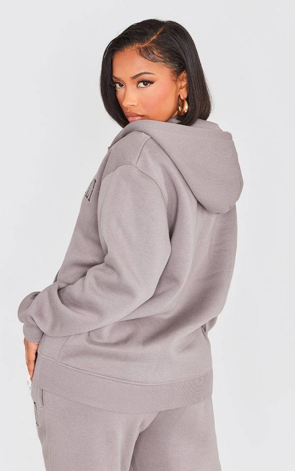 32dc772dcfcf94fdaa7619c7fe988acf63554599_CNG6795_2_prettylittlething_shape_charcoal_embroidered_zip_through_hoodie