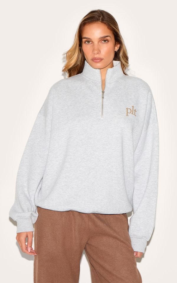 331e5854ee5bfb1d5ebee3e5975f53f293146176_CNM3807_1_prettylittlething_ash_grey_printed_quarter_zip_sweatshirt