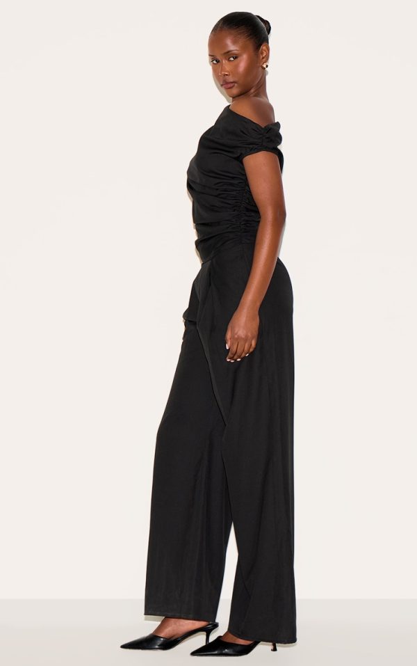 3442f4a162c187ac7dd1517322de5222b6520a45_CNM0443_3_black_woven_ruched_one_sleeve_jumpsuit
