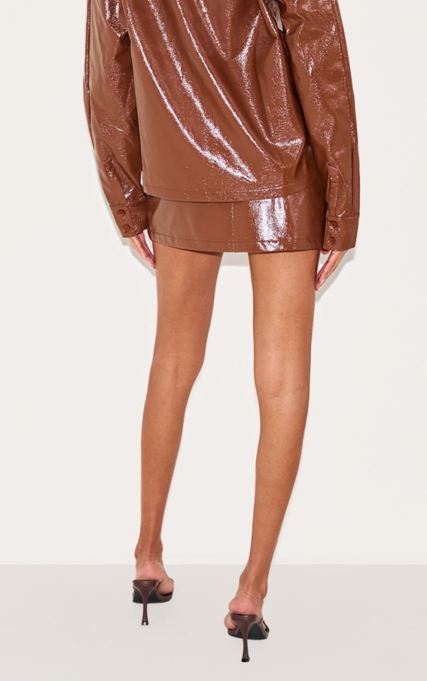 347d9a7c417bfa1cb8c5612013a976f1c31d6e10_CNL6586_3_chocolate_faux_leather_mini_skirt