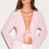 3529c4058ed0f40c6b35e2995e758566ed9f6948_CNN0897_1_pale_pink_sheer_plisse_tie_front_flute_sleeve_blouse