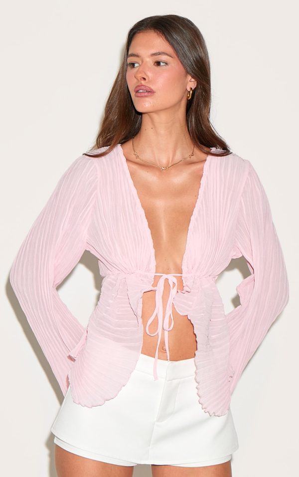 3529c4058ed0f40c6b35e2995e758566ed9f6948_CNN0897_1_pale_pink_sheer_plisse_tie_front_flute_sleeve_blouse