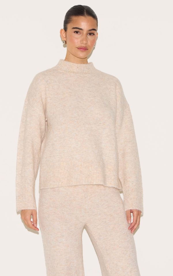 357ac9992af6dbe386b4c644813fe333d3af125a_CNG7663_2_stone_luxe_knit_high_neck_open_back_jumper