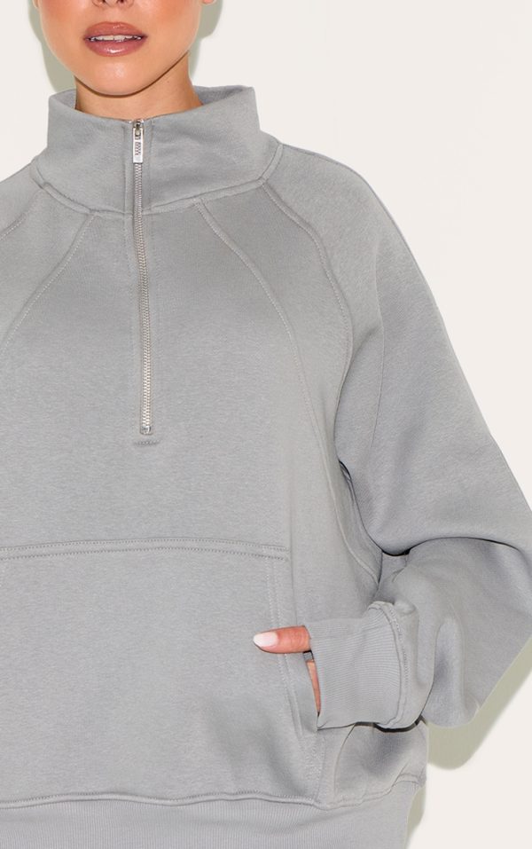 360f8bb22c77d9bdd8b3951079eea7c1a5d0af1c_CNL5258_4_stone_panel_detail_zip_up_pocket_oversized_sweatshirt