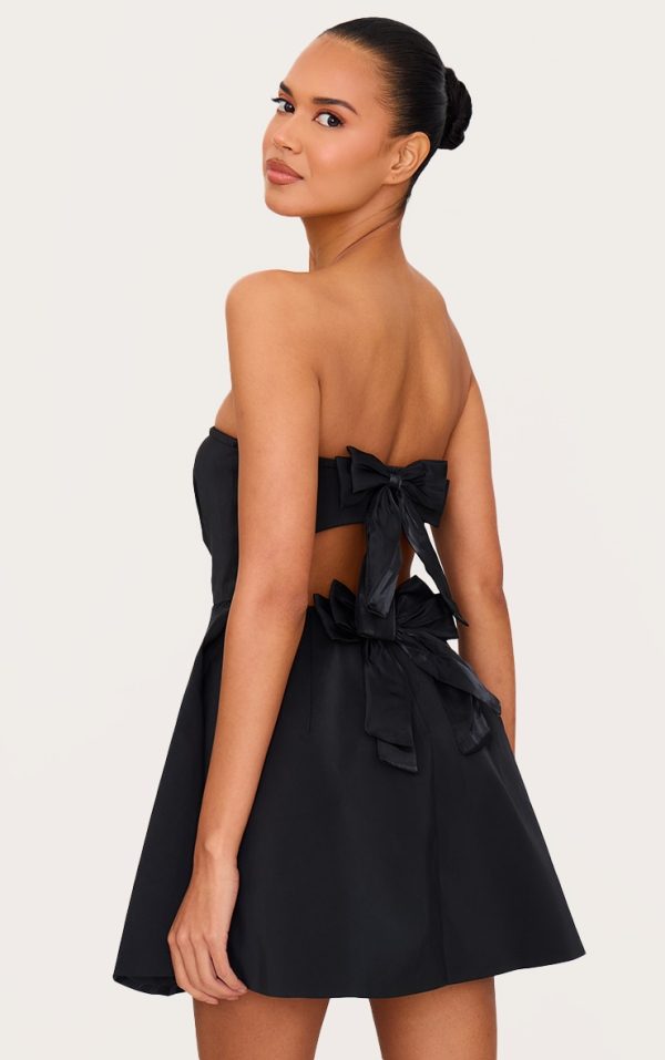 37b394ba5792607caab67e428f26645f8986ec81_CNL4664_1_black_satin_bandeau_bow_back_shift_dress
