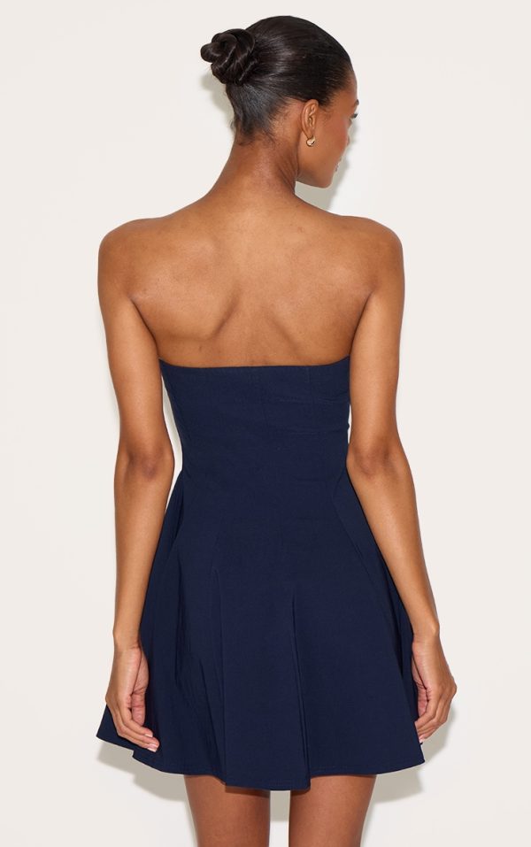 37e27b560324a0942d4a8f5fe93b6e9c2a3a837c_CNN1640_2_navy_stretch_woven_bandeau_pleated_shift_dress