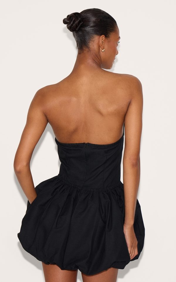 38785e3e9e7848aa1c6862cbab572162fcec5aa4_CNL8933_2_black_linen_bandeau_tie_waist_puffball_dress