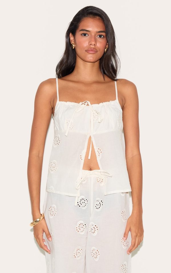 3889c461db6fe46be6ad5d7c26ae37def1661e00_CNM6112_1_white_broderie_swirl_detail_floaty_top
