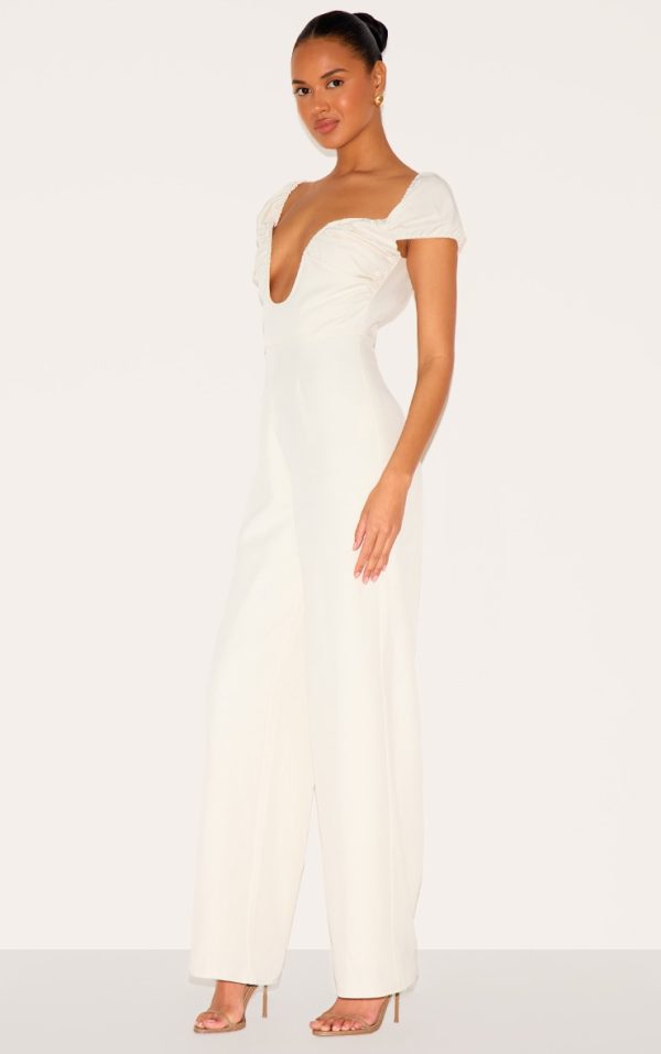 38b546493482d010a574164df4a98d25216af710_CNL9261_3_cream_woven_plunge_straight_leg_jumpsuit
