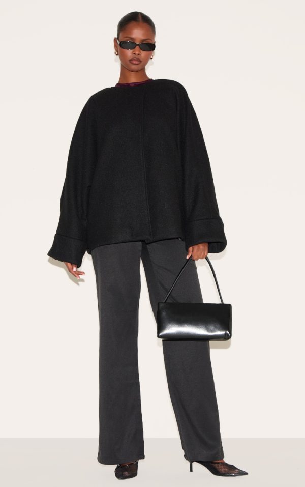 39755c91e15e1df932eb12f218aea50c08efe49c_CNM5312_3_black_wool_look_batwing_jacket-1