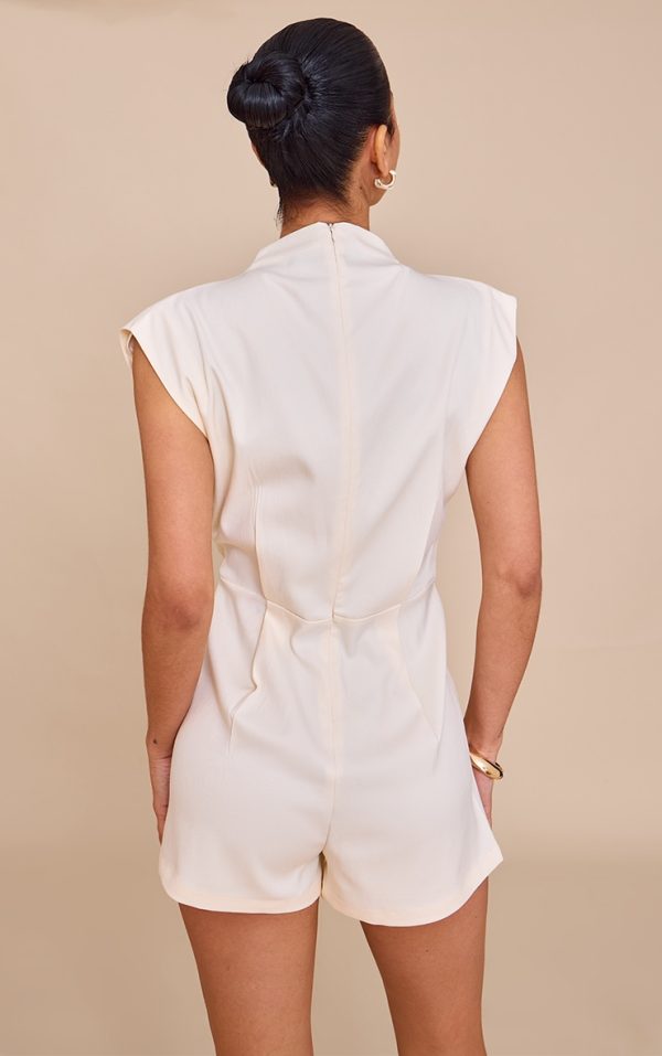 399cd743e5384bef24b088d3d578d54b44acbacc_CNN0143_2_almond_woven_bagged_over_boat_neck_playsuit