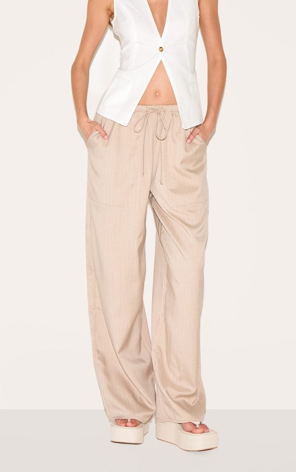 39fd8977cf7f37193836be62656589d814e82527_CNL7554_2_stone_pinstripe_woven_drawstring_low_rise_relaxed_trousers
