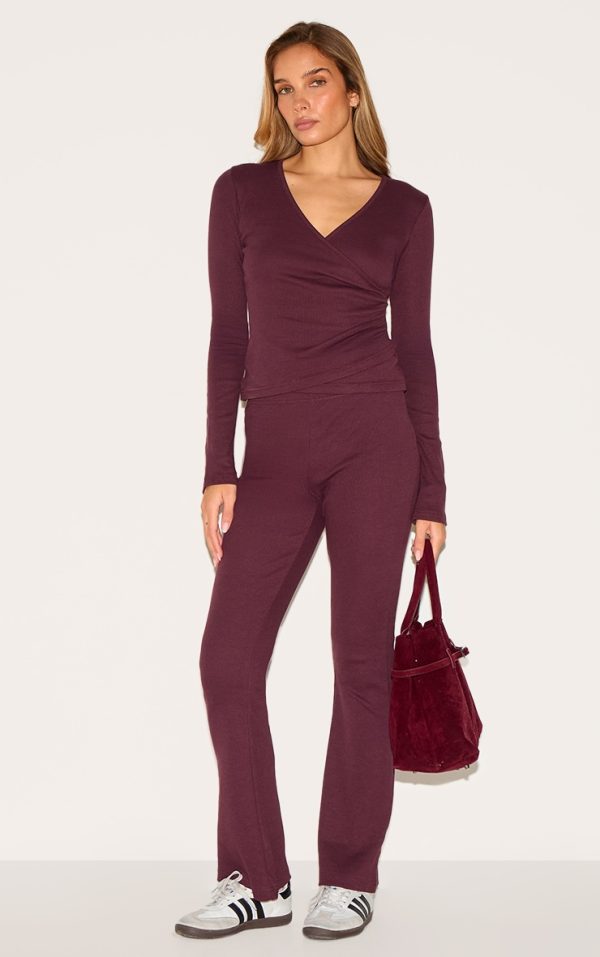 3a4c19860cd56d56bdf3cf2ec168bc888cc41729_CNL7619_1_plum_ribbed_elasticated_skinny_flare_trousers