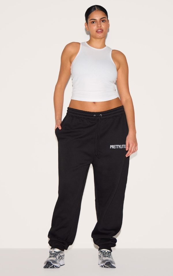 3b8cdeee48f49238ce384d9cc54b302045f2872d_CNL9475_1_prettylittlething_plus_deep_black_high_waisted_cuffed_joggers