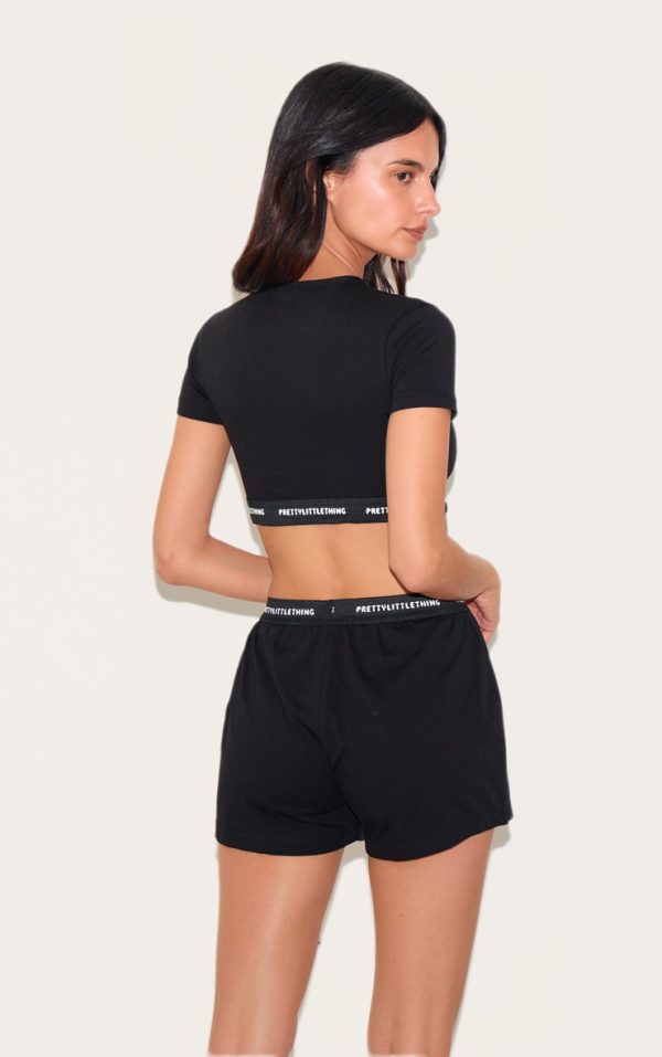 3ba33fd7bbbb1ad3c68d4c24a81d94b10e8491bf_CNK2315_2_prettylittlething_black_tape_short_sleeve_pj_top-1