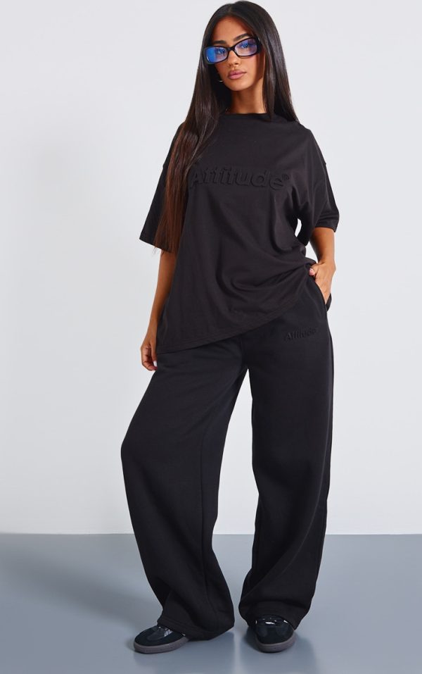 3bd0d43854fe1e02f65b7ffcb8c0af78faf363b4_CNJ6915_1_petite_black_embossed_wide_leg_jogger