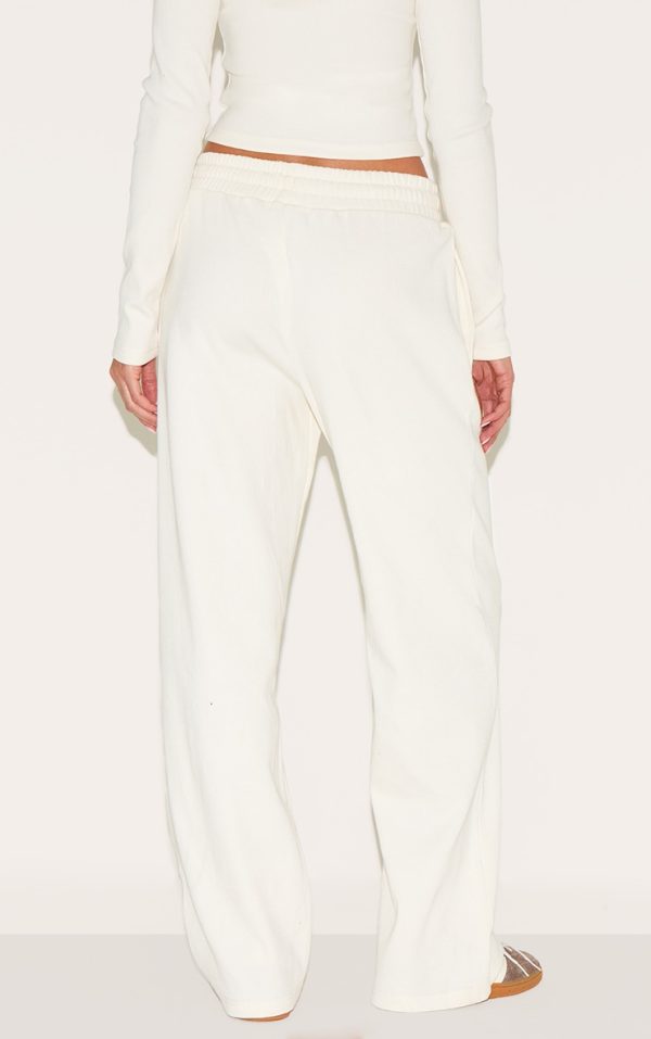 3d11bb267c6a91fdefde97ef2f1fb4b5a4ec7ce4_CNM4582_3_cream_wide_leg_ribbed_trousers