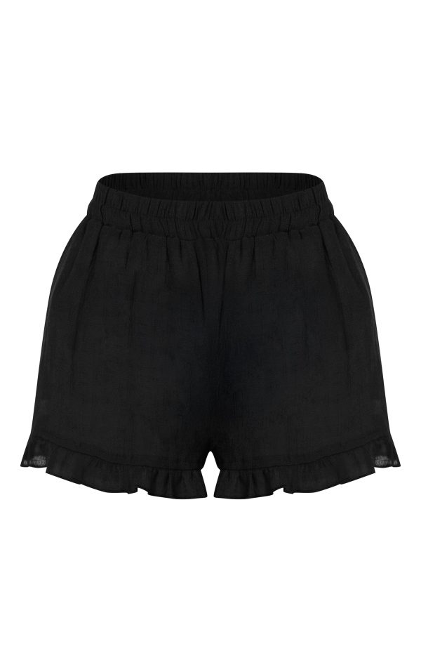 3d1c9ebb1892a0072d004e8fcf4ef3efecbed8ba_CNL6995_6_black_textured_woven_frill_edge_shorts-1