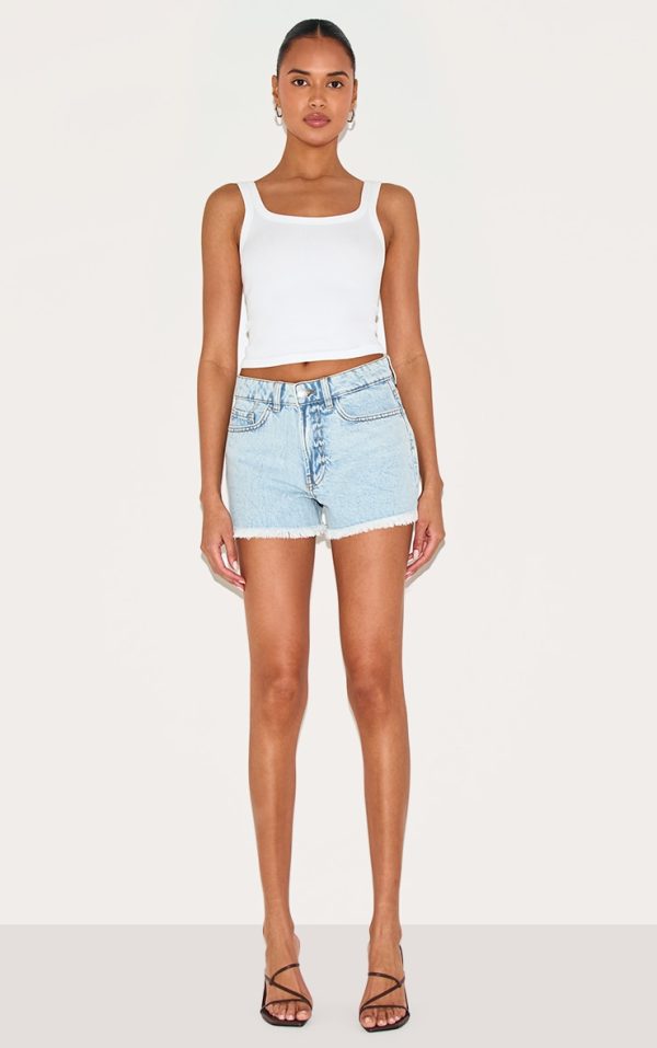 3d37c7ec850169f53a97962c3bbf75976d8bd021_CNI3647_1_light_blue_wash_distressed_mid_rise_basic_denim_shorts