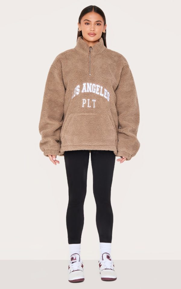 3da668ab91757d3aa3549e83af083e3e86fe00d1_CNL1863_3_taupe_quarter_zip_pocket_detail_fleece