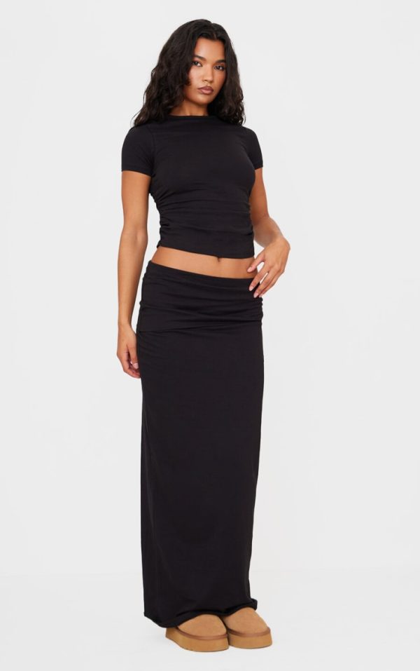 3edfe5e9179ae3b7e9fc3ce492e6d3b0335323c5_CNK5250_3_black_cotton_side_cap_sleeve_ruched_top-1
