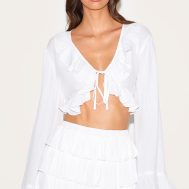3f0c00f2fa27825a6ff530447abf3fcd01295f2f_CNM3231_1_white_cheesecloth_ruffle_tie_front_long_sleeve_top