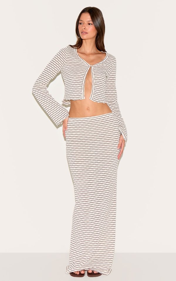 3f0c702bcdb3171ed608f8136ebc335bf9ff2757_CNM7407_1_chocolate_brown_textured_striped_mid_rise_maxi_skirt
