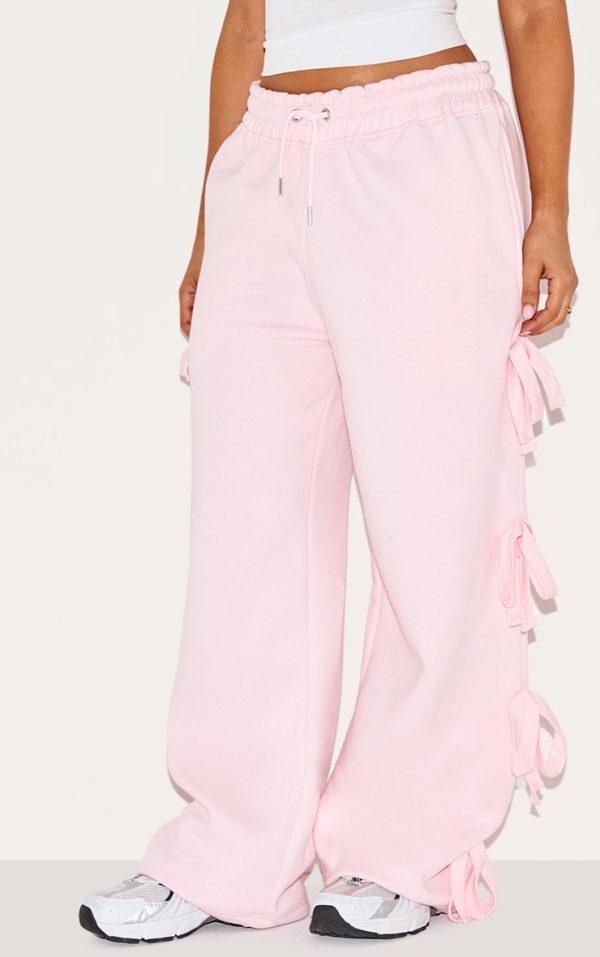 3f3f1bae668933a47ed7db67152e9521dc152973_CNK0422_2_petite_baby_pink_wide_leg_joggers_with_bow_details