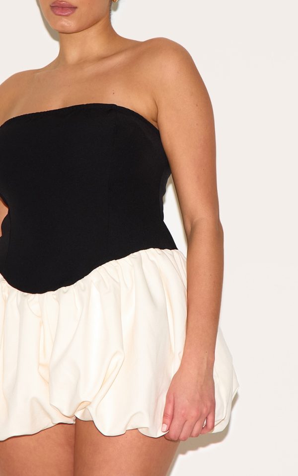 3ff3c311e60ef2769b9a1da0218a694ab6a20be2_CNM2023_4_plus_black_contrast_woven_bandeau_puffball_playsuit