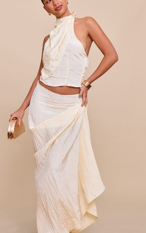 402478dc8e14bc91c2ffa3980c50ee43791c4ac5_CNM8808_4_butter_yellow_textured_woven_floaty_maxi_skirt