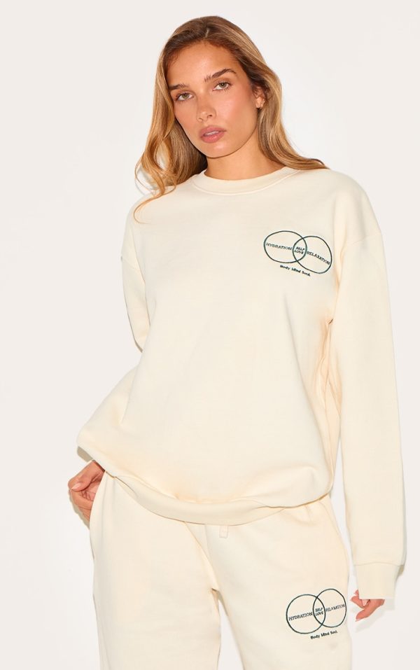 4030fa94ce16742bbfafb080dee5274176d5572e_CNL8276_1_cream_circle_wellness_premium_print_oversized_sweatshirt
