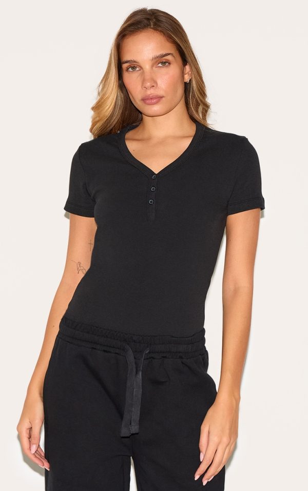 4037aecc53acf279cdeb9de7a499d39c27726518_CNL8033_1_black_premium_interlock_button_down_short_sleeve_bodysuit