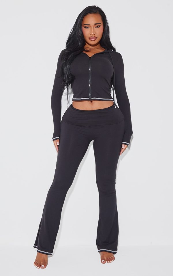 4042a86b521e98a205dc72e10c4859bc7871ff14_CNJ9554_1_shape_black_sculpted_contrast_stitch_foldover_waist_flare_trousers