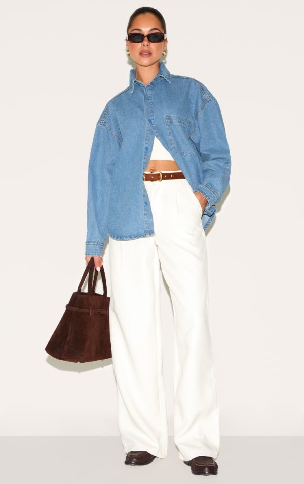 4138e08790bfc291fd6bc3f5abda54361f1f897e_CNL6618_1_mid_blue_wash_dip_hem_button_up_denim_shirt