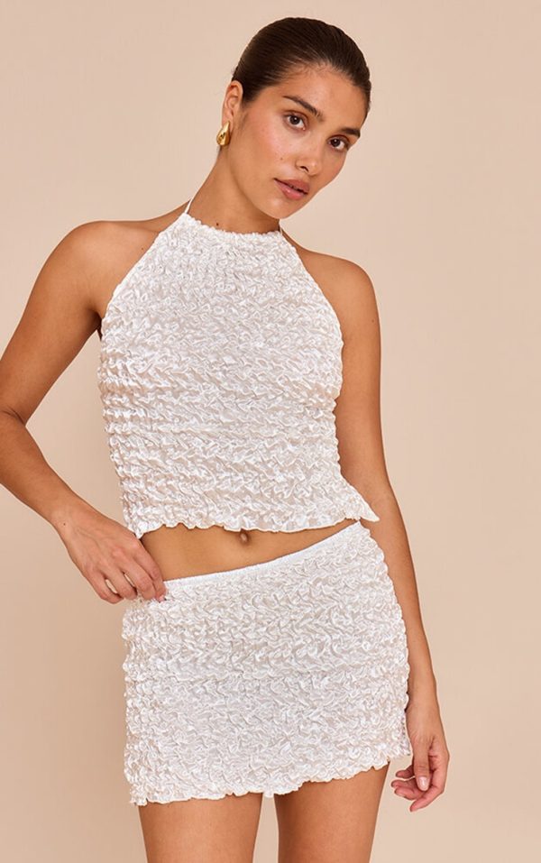 413f55acb4fca07d34cd7c562bc154a50d55bec7_CNM7077_1_petite_white_open_back_textured_shirred_top