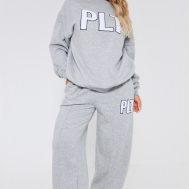 41658f9b03f0f1a1ea10f107637ae12fbe0bf136_CNF8397_1_prettylittlething_ash_grey_borg_applique_wide_leg_joggers