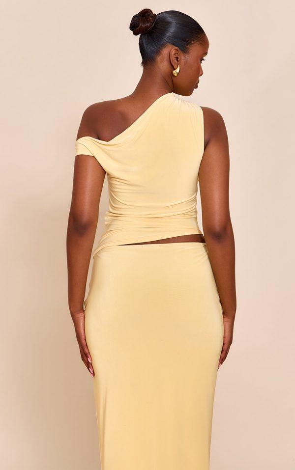 4165cd5170809631c67ae2e34ac9752bdd4cee73_CNM9239_2_butter_yellow_double_layered_slinky_one_shoulder_longline_top