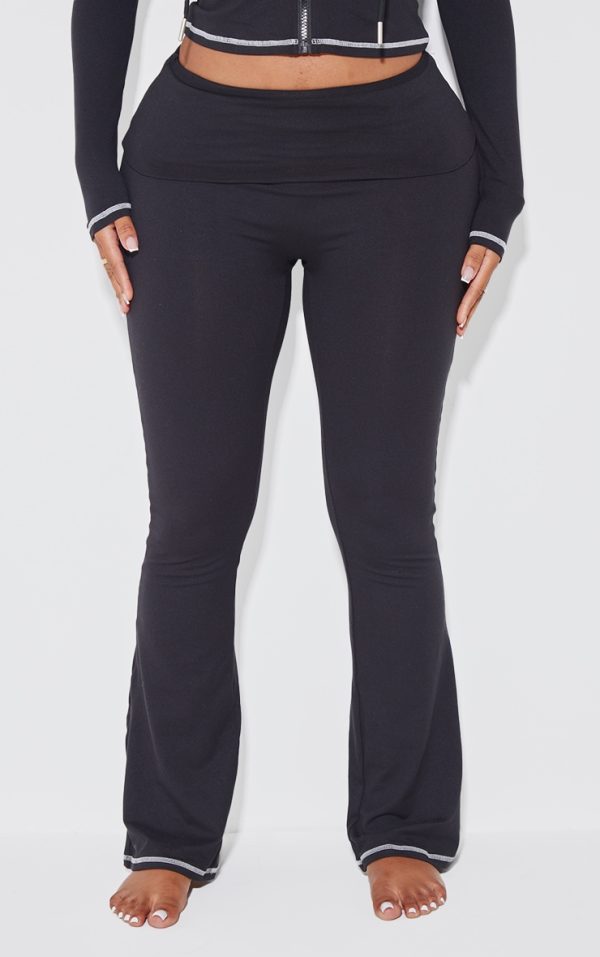 41ad06c8cdcac443fe5319706f369d1937ce6f71_CNJ9554_2_shape_black_sculpted_contrast_stitch_foldover_waist_flare_trousers-1