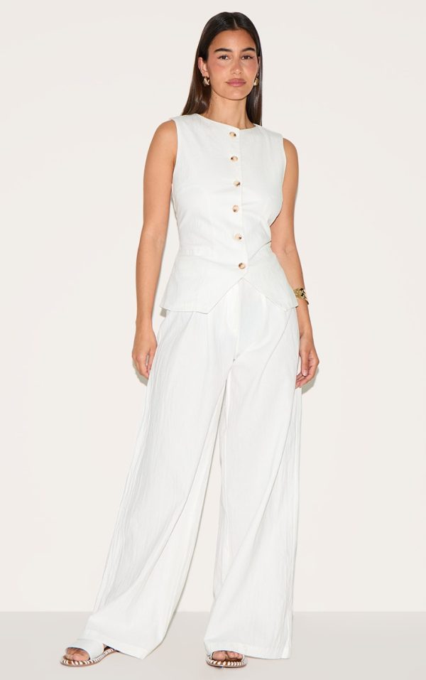 41e56eee6dc7369295d01df21d19e8780ce87dc3_CNM4200_1_white_wide_leg_pleated_trousers